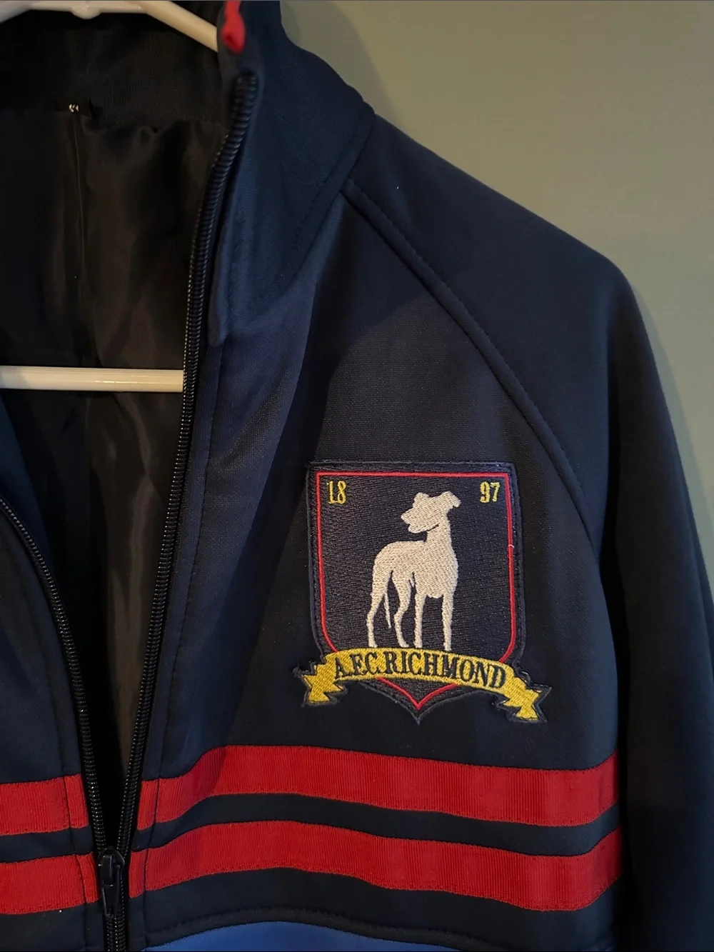 Ted Lasso AFC Richmond Navy and Royal Blue Zip-Front Jacket with Red Stripes - Picture 2 of 4